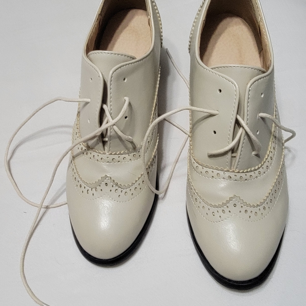 Never worn Size 9.5 shoe